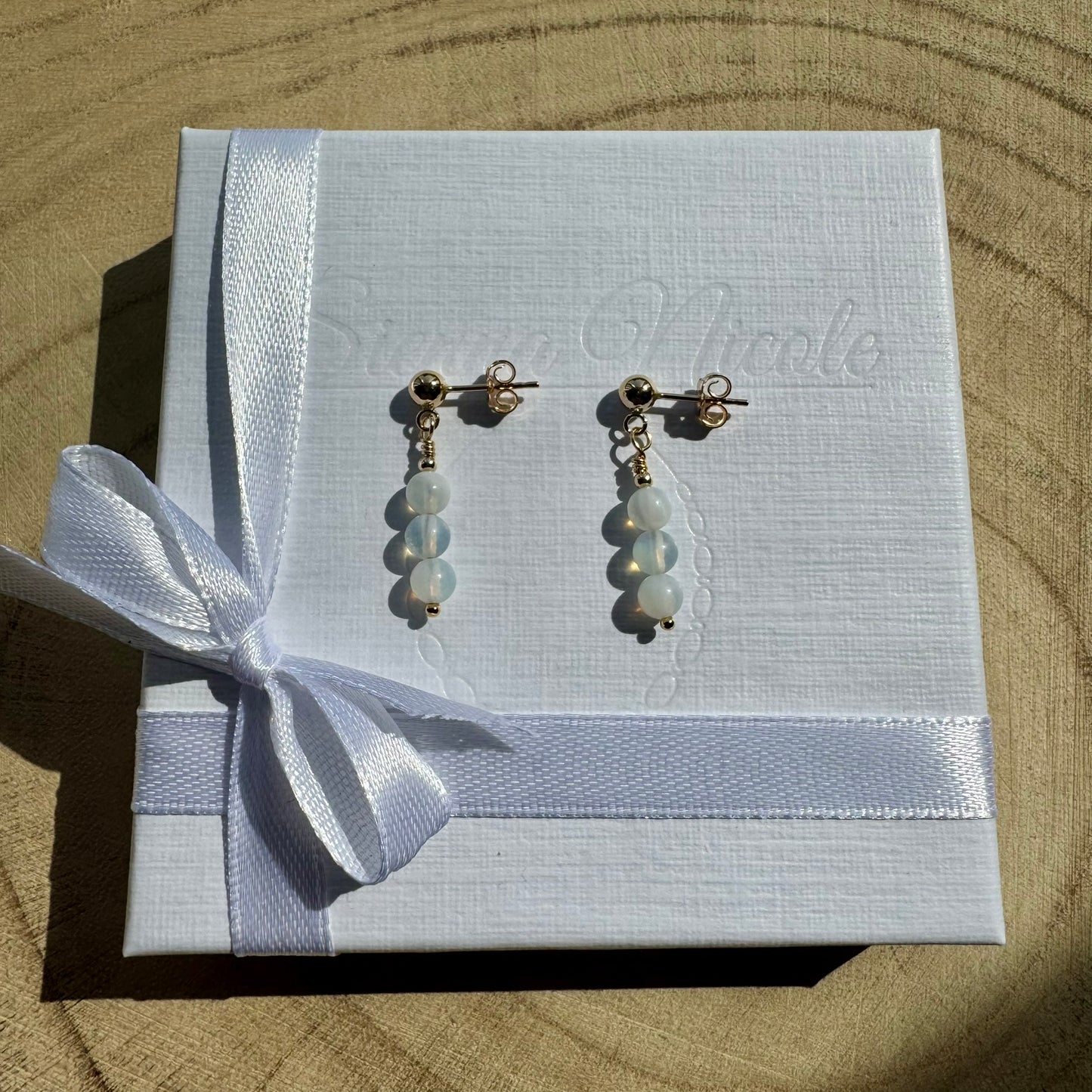 Pair of Gold Filled opalite earrings on white gift packaging